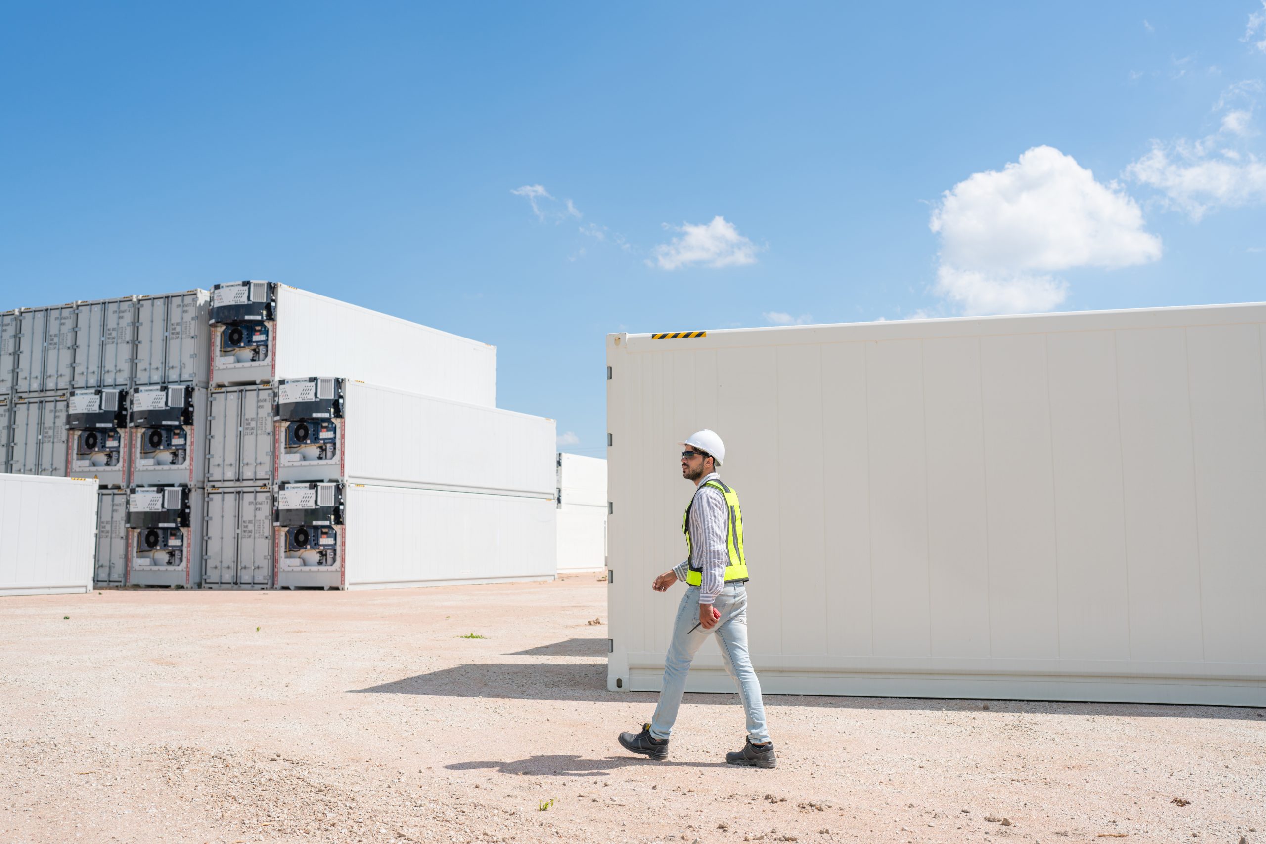 container yard worker checking container at container yard wareh